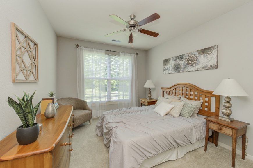 Model bedroom in a Bloomington apartment.