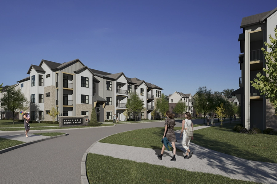 Not all Bloomington apartment communities offer coach homes like Crossing 5 does. Two women walking through an apartment community